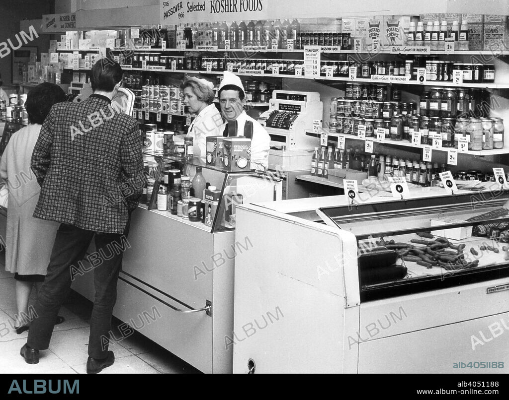 Kosher display at Selfridges, London, 1966. Customers at the counter of the kosher section in the food hall of the famous department store.
