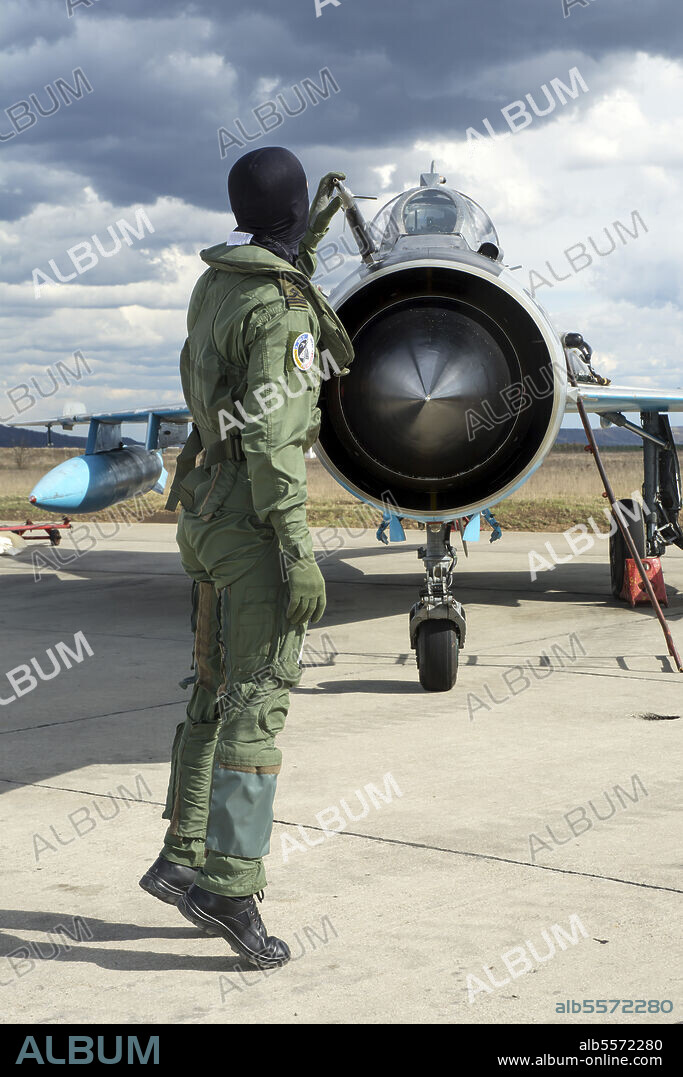 Romanian Air Force pilot during the pre-flight check of his MiG-21 LanceR C at Camp Turzii Air Base, Romania.