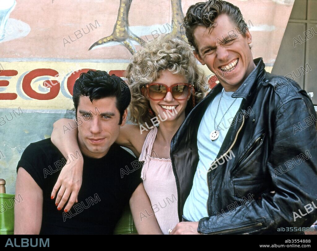 JEFF CONAWAY, JOHN TRAVOLTA and OLIVIA NEWTON-JOHN in GREASE, 1978, directed by RANDAL KLEISER. Copyright PARAMOUNT PICTURES.