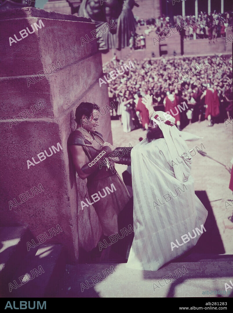 CHARLTON HESTON and HUGH GRIFFITH in BEN-HUR, 1959, directed by WILLIAM WYLER. Copyright M.G.M.