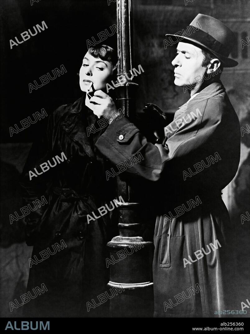 CHARLES BOYER and INGRID BERGMAN in ARCH OF TRIUMPH, 1948, directed by LEWIS MILESTONE. Copyright UNITED ARTISTS.