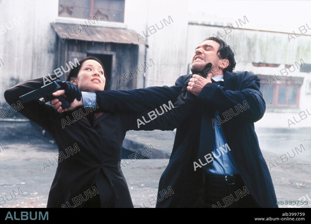 ANTONIO BANDERAS and LUCY LIU in BALLISTIC: ECKS VS. SEVER, 2002, directed by WYCH KAOSAYANANDA. Copyright CHRIS LEE PRODUCTIONS/DANTE ENTERTAINMENT/SUPERMEGA/FRANCHIS / MARKFIELD, ALAN.