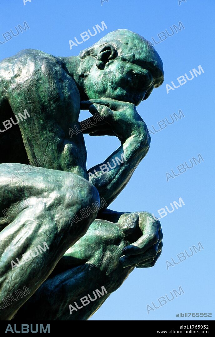Auguste Rodin's statue of The Thinker (Le Penseur) 1880-1904 stands outside the Musee Rodin, in the grounds of the Hotel Biron, Paris, France, Rodin lived in this 18th century mansion from 1908 until his death in 1917, after which it became a museum of his work, The Thinker statue is thought to represent the Italian poet Dante *** Local Caption ***.