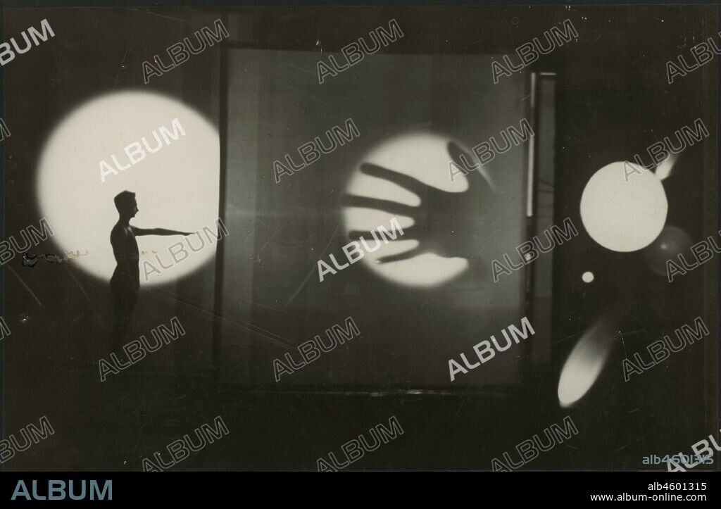 THEODORE LUX FEININGER. Bauhaus Stage Dessau: Light Play by Oskar Schlemmer with the dancer and pantomime Werner Siedhoff.