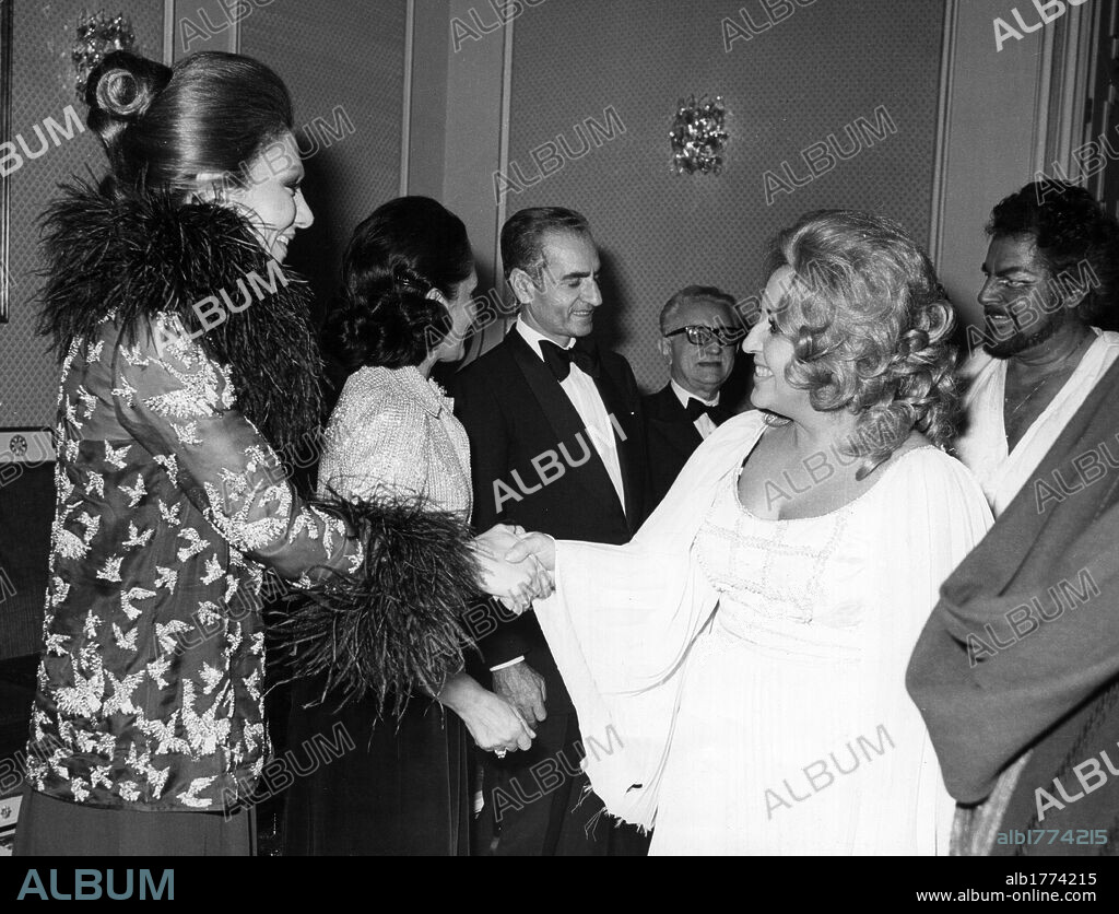 Reza Pahlavi and Farah Diba with Giovanni Leone and his wife. Shah of Persia Reza Pahlavi, Farah Diba, the President of the Italian Republic Giovanni Leone and his wife Vittoria greeting some actors. 1970s.