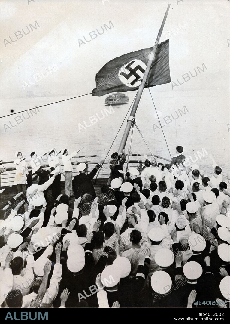 A salute to the Nazi party flag on the SS Bremen, New York, c1935.