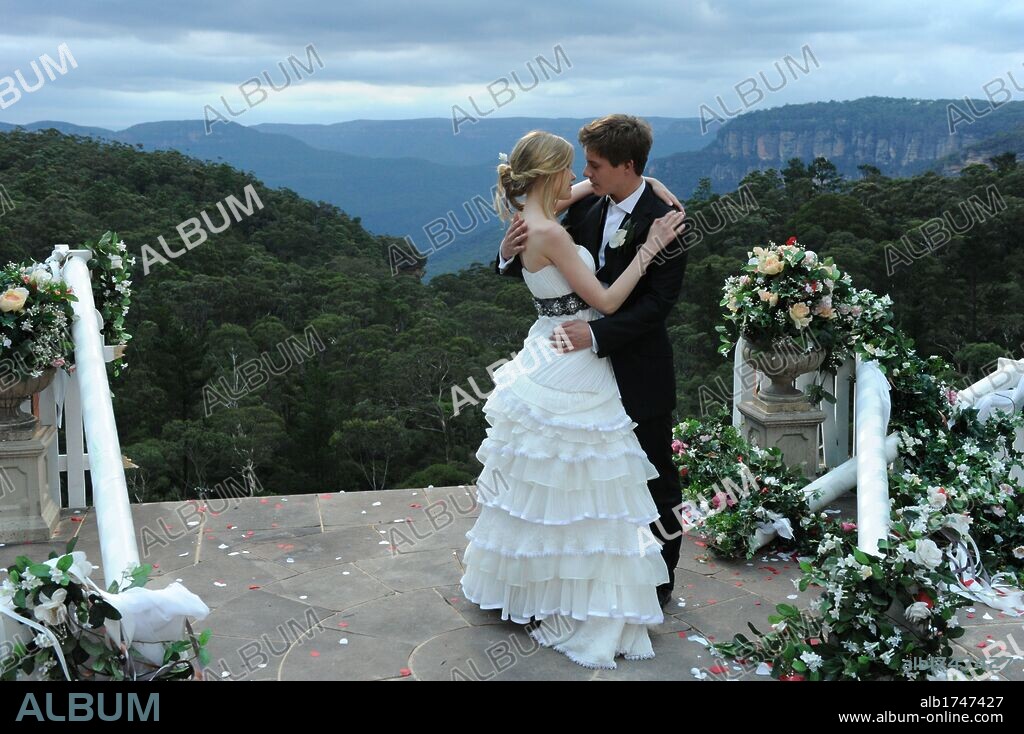 LAURA BRENT and XAVIER SAMUEL in A FEW BEST MEN, 2011, directed by STEPHAN ELLIOTT. Copyright PARABOLIC PICTURES.