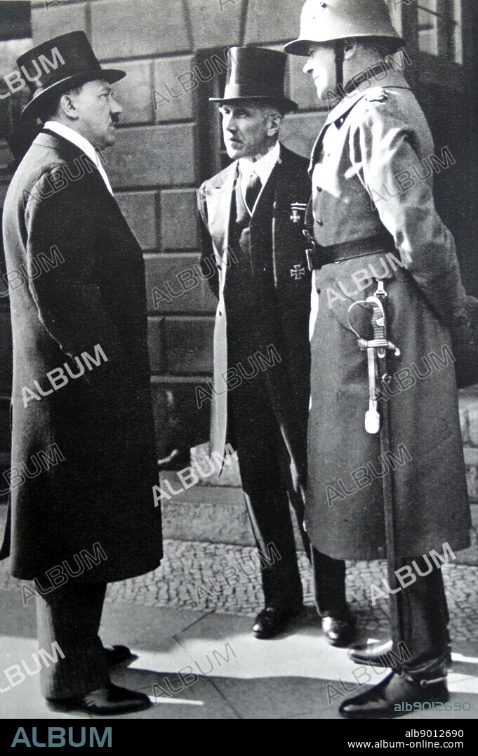 Adolf Hitler ; Franz von Papen (centre) and General Werner von Blomberg; Chief of the Armed Forces.