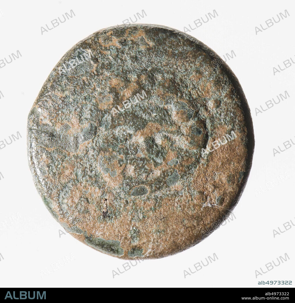 Obverse: Monogram of Demetrios in a Macedonian shield. Worn out. Reverse: Macedonian helmet with helmets and cheek flaps., Coin, from Demetrios Poliorketes, metal, bronze, diam: 1,5 cm, wt. 3.9 grams, Approximately 290 BC, unknown.