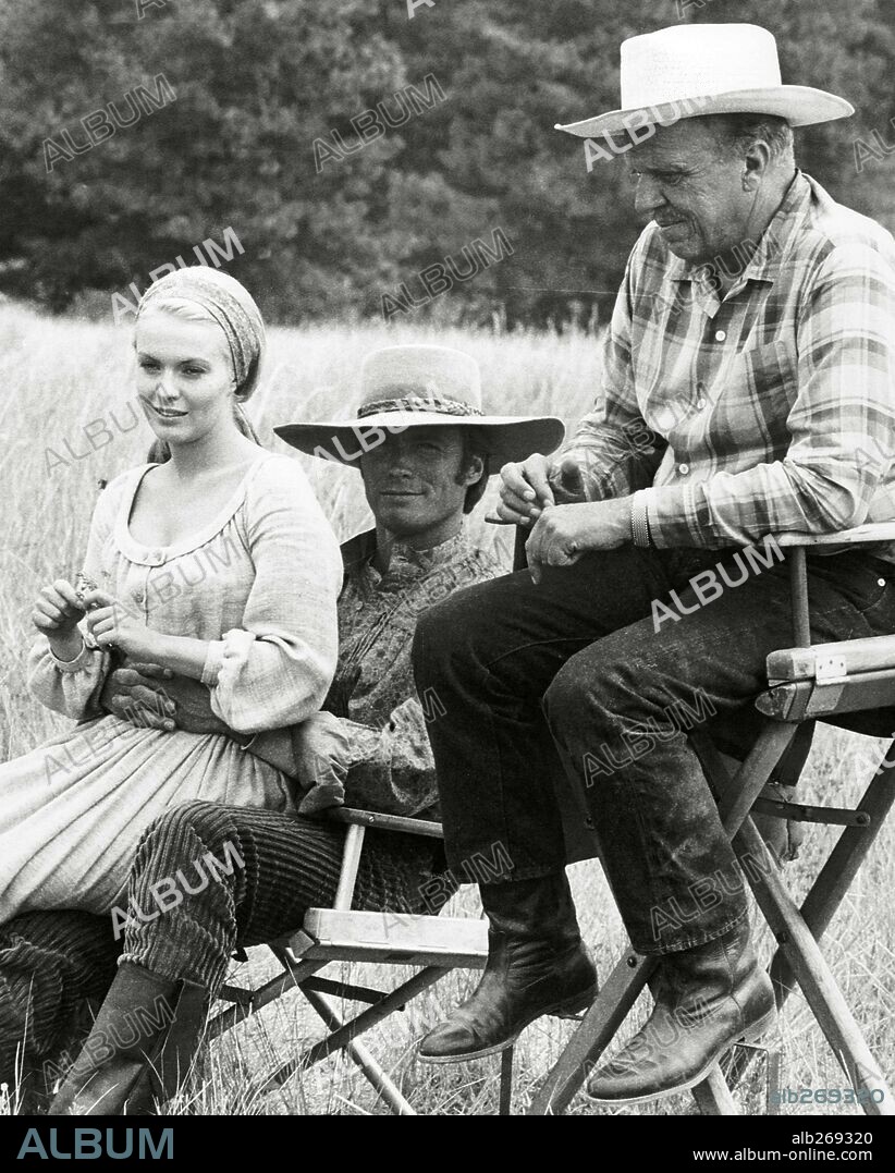 CLINT EASTWOOD, JEAN SEBERG and JOSHUA LOGAN in PAINT YOUR WAGON, 1969, directed by JOSHUA LOGAN. Copyright PARAMOUNT PICTURES.