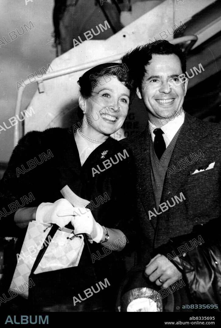 Sailing In -- Together again, Larry Parks went to Southampton to meet his actress wife, Betty Garrett, when she arrived on the liner Queen Elizabeth to-day. June 8, 1954. (Photo by Daily Mail Contract Picture).