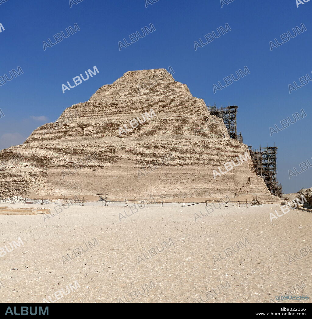 Step Pyramid of Djoser, at Saqqara, Egypt. Saqqara was an ancient burial ground in Egypt, serving as the necropolis for the Ancient Egyptian capital, Memphis. Djoser was the first or second king of the 3rd Dynasty (ca. 2667 to 2648 BC) of the Egyptian Old Kingdom (ca. 2686 to 2125 BC).