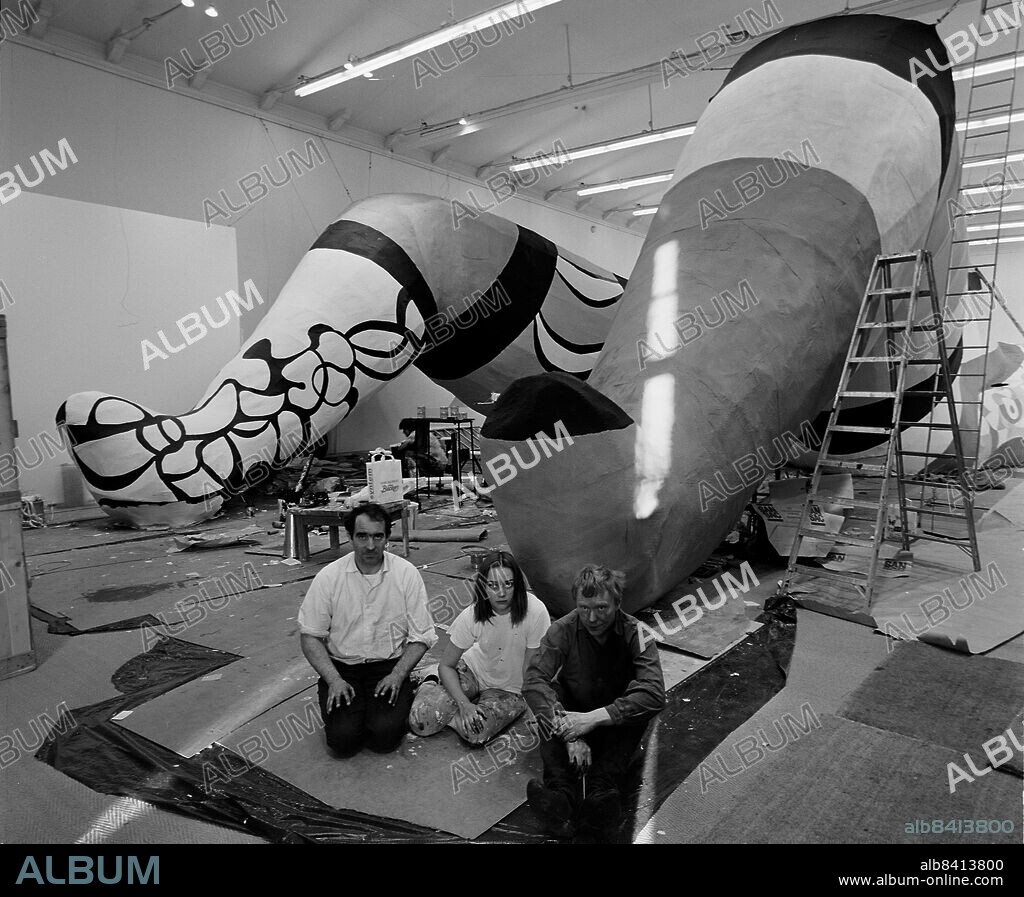 A picture dated 31 May 1966 of sculptress Niki de Saint-Phalle (C) with fellow artists Jean Tinguely (L) and Per Olof Ultvedt (R) during the construction och their giant sculpture "She-a cathedral" at the Museum of Modern Art in Stockholm. Saint-Phalle died at the age of 71 in San Diego, Ca., USA, on Tuesday 21 May 2002. Foto Hans Erixon Kod 190 . COPYRIGHT SCANPIX SWEDEN.