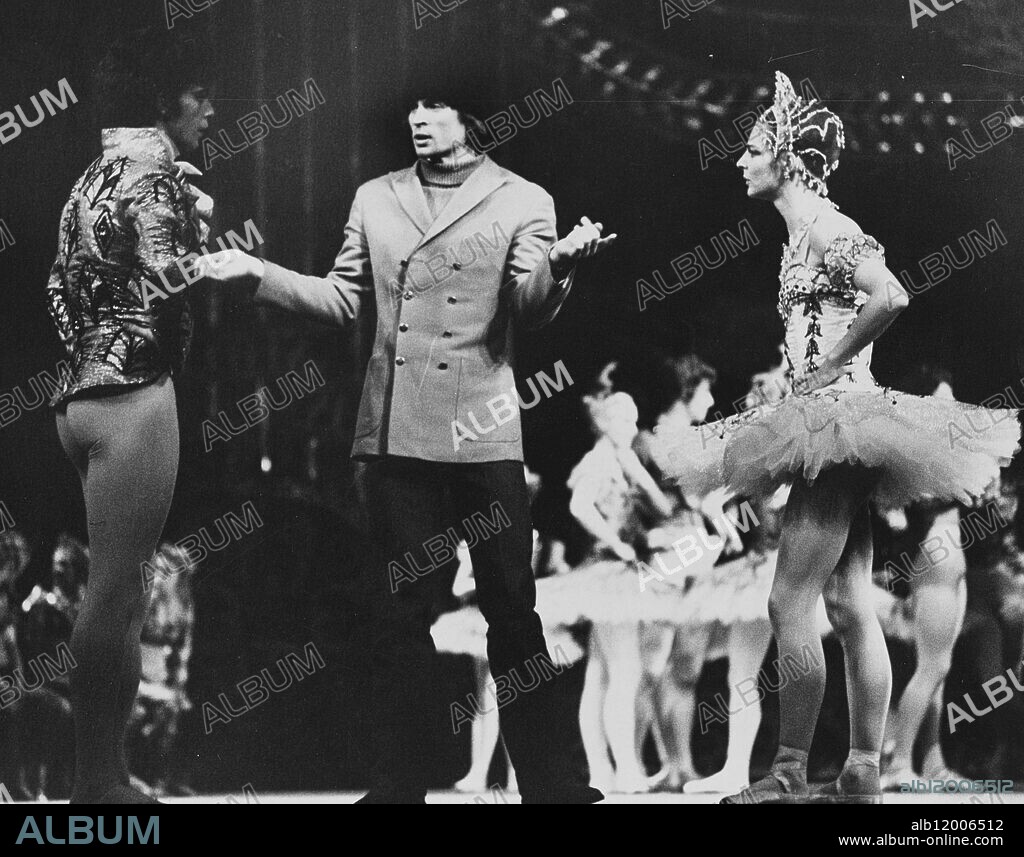 Queen Mother And Margaret To See Nureyev Production. Rudolf Nureyev's production of "The Nutcracker" will have it's premiere at a Royal Ballet Benevlent Fund Gala at the Royal Opera House, Covent Garden, on Tuesday in the presence of the Queen Mother and Princess Margaret. Photo shows: The famous Russian dancer Rudolf Nureyev on the stage at Covent Garden today directing the two stars, Anthony Dowell and Antoinette Sibley, during a dress rehearsla today. London, England. 28 February 1968.