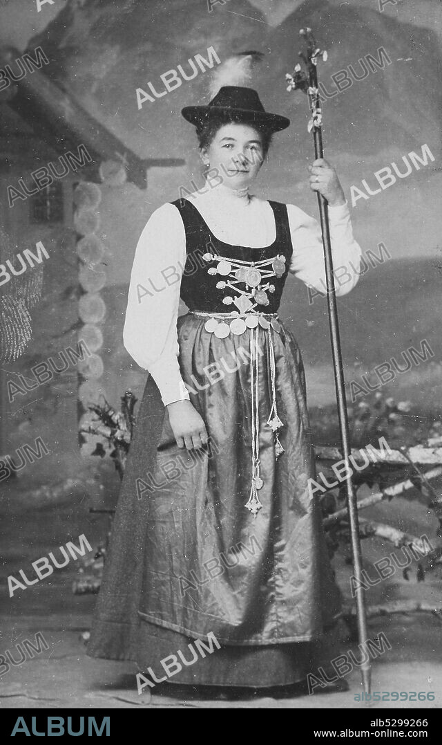 Woman from Bavaria in costume robe with Charivari jewelry chain, 1890, Germany  /  Frau aus Bayern im Trachtengewand mit Charivari Schmuckkette, 1890, Deutschland, Historisch, historical, digital improved reproduction of an original from the 19th century / digitale Reproduktion einer Originalvorlage aus dem 19. Jahrhundert, Carte de visite, a type of small photograph which was patented in 1854, each photograph was the size of a visiting card, and such photograph cards were commonly traded among friends and visitors in the 1860s  /  Visitformat, Carte de Visite, auf Karton fixierte Fotografie im Format ab ca. 6 × 9 cm, ab ca. 1860 wurde die Carte de Visite sehr populär und trug wesentlich zur Verbreitung der Fotografie bei.