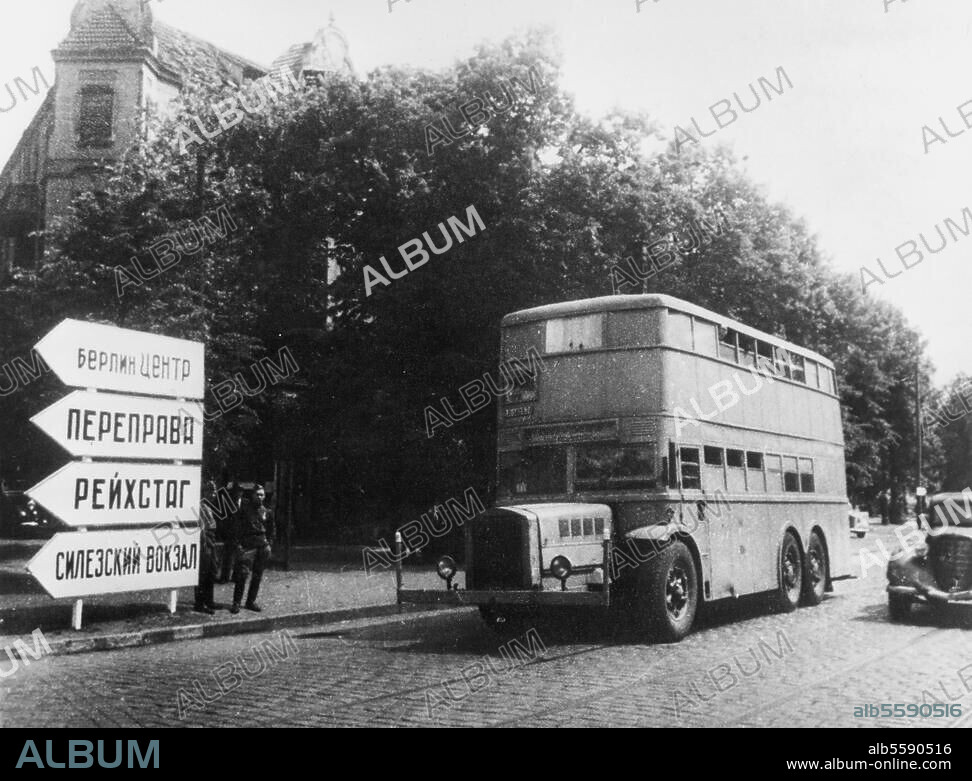 Berlin, summer 1945. World War II / End of the War. Street with signs in Cyrillic letters. Photo, Yevgeny Khaldei.