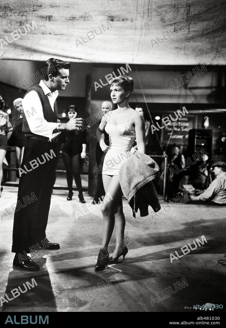 DEBBIE REYNOLDS and ROBERT WAGNER in SAY ONE FOR ME, 1959, directed by FRANK TASHLIN. Copyright 20TH CENTURY FOX.