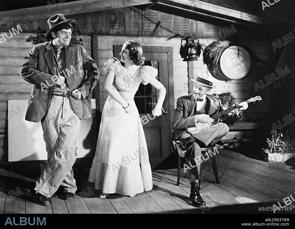 BARBARA STANWYCK, BUDDY EBSEN and WALTER BRENNAN in BANJO ON MY KNEE, 1936, directed by JOHN CROMWELL. Copyright 20TH CENTURY FOX.