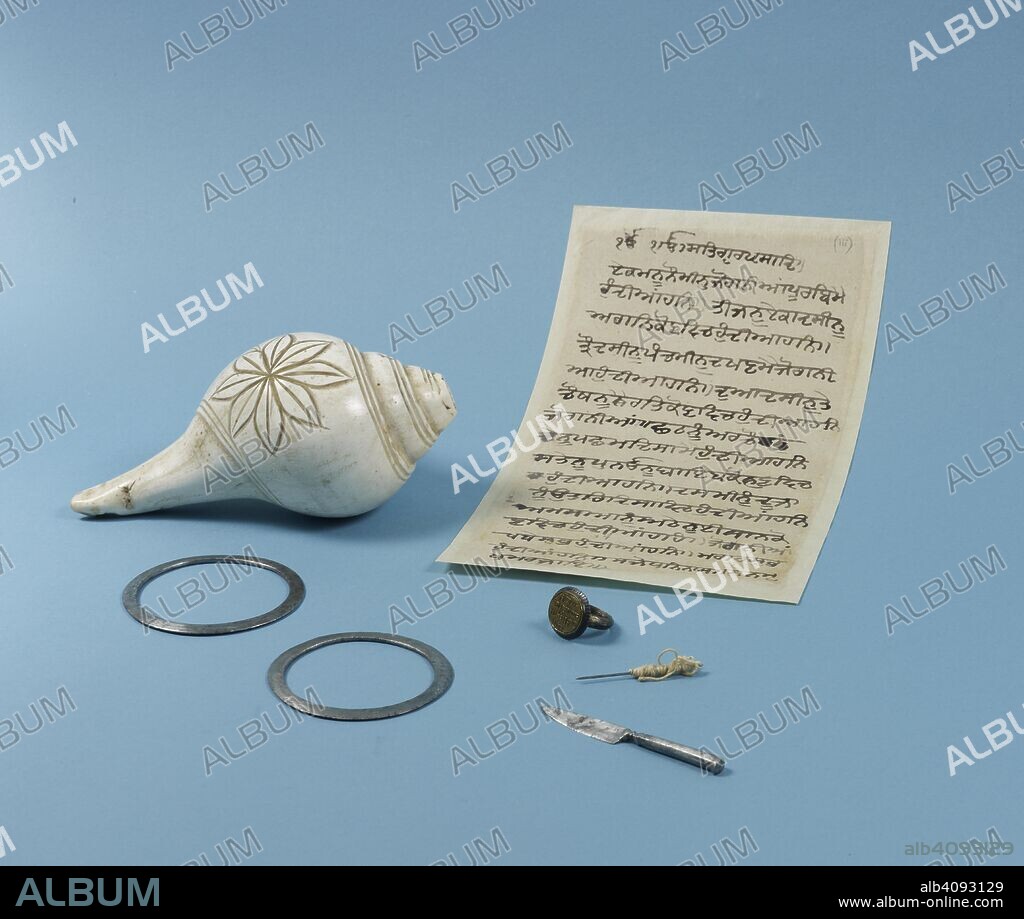 ANON. Conch shell with carved design. Conch shells (sankha or shankha) are common accessories of ascetics in India.  This one has been cut at the tip so it can be blown into to make a loud noise. During the lifetime of Bhai Maharaj Singh conches such as this were used during daily religious activities. The shell measures 17 cm across at its longest point. F5009 - Conch shell F5010 - Finger ring F5011 - Small knife F5012 - Sewing needle and cotton F5013 - Two steel quoits Mss Panj.A7 - Two hymns and a formula . Bhai Maharaj Singh Collection. India, 1840's. These objects belonged to Bhai Maharaj Singh, a Sikh warrior and leader who was a key player in the Second Anglo-Sikh War (1848-49). The objects listed were confiscated by Henry Vansittart in 1849 and were given to the India Office Library between 1925 and 1927 by his son. Source: F.5009 F.5010 F.5011 F.5012 F.5013 & panj.A.7.