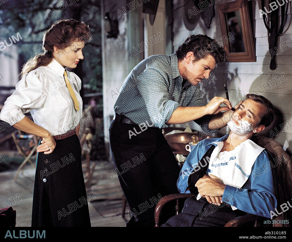 ALAN LADD, BRENDA MARSHALL y ROBERT PRESTON en SMITH EL SILENCIOSO, 1948 (WHISPERING SMITH), dirigida por LESLIE FENTON. Copyright PARAMOUNT PICTURES.