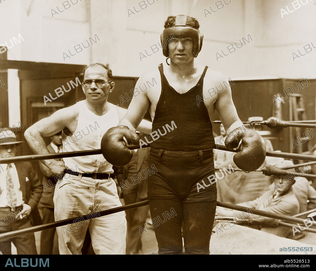 Jack Dempsey (right), American Professional Boxer, World Heavyweight Champion 1919-1926, with trainer Jerry Luvadis, three-quarter length Portrait, Underwood & Underwood, 1933.