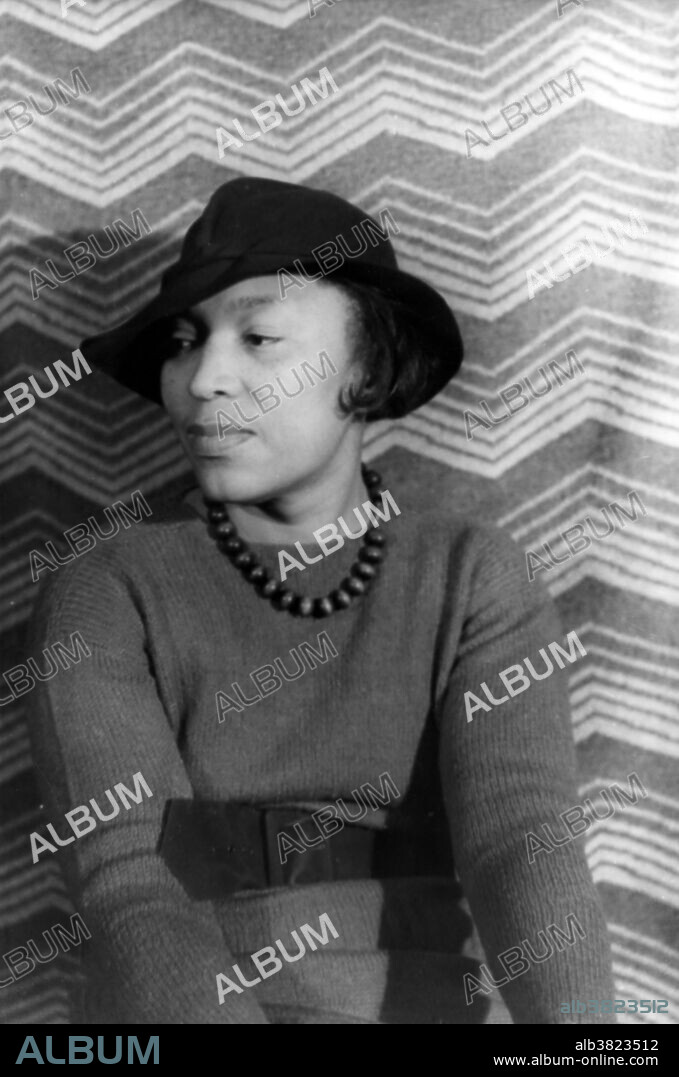 Zora Neale Hurston (January 7, 1891 - January 28, 1960) was an American folklorist, anthropologist, and author. When Hurston arrived in NYC in 1925, the Harlem Renaissance was at its peak, and she soon became one of the writers at its center. By the mid-1930s, she had published several short stories and the critically acclaimed Mules and Men (1935), a groundbreaking work of "literary anthropology" documenting African-American folklore from timber camps in North Florida. Her last published novel, Seraph on the Suwanee, notable principally for its focus on white characters, was published in 1948. Her work slid into obscurity for decades, for a number of cultural and political reasons. Many readers objected to the representation of African-American dialect in Hurston's novels, given the racially charged history of dialect fiction in American literature. She died of hypertensive heart disease in 1960, at the age of 69, and was buried in an unmarked grave. She was inducted as a member of the inaugural class of the New York Writers Hall of Fame in 2010. Photographed by Carl Van Vechten, April 3, 1938.