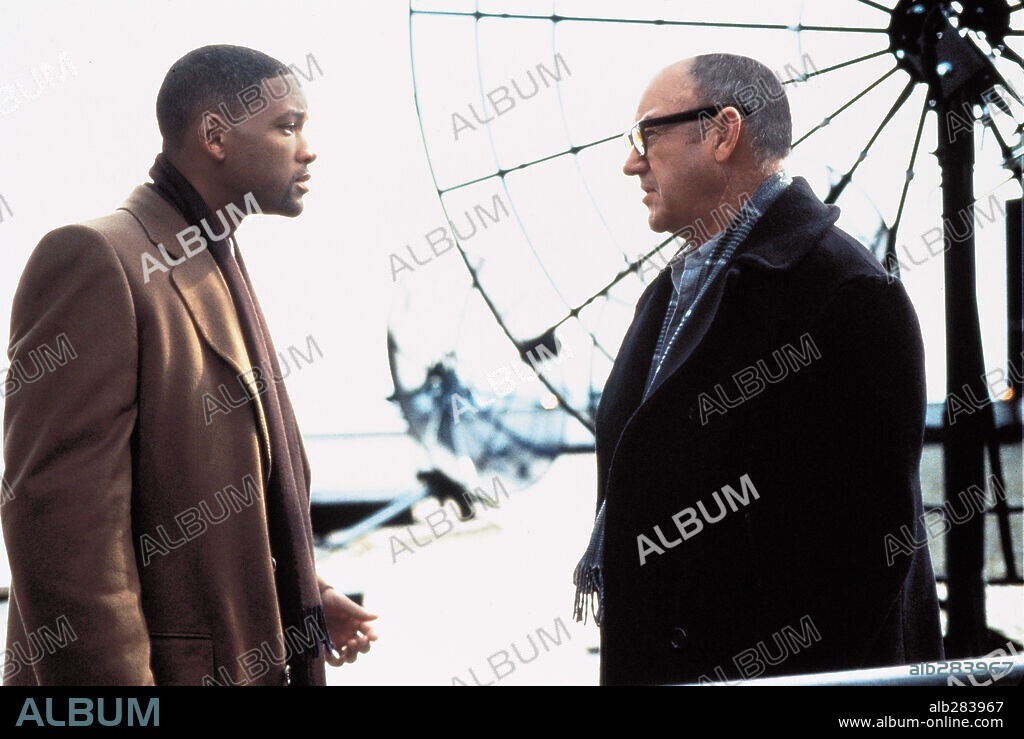 GENE HACKMAN and WILL SMITH in ENEMY OF THE STATE, 1998, directed by TONY SCOTT. Copyright TOUCHSTONE PICTURES / CHEN, LINDA R.