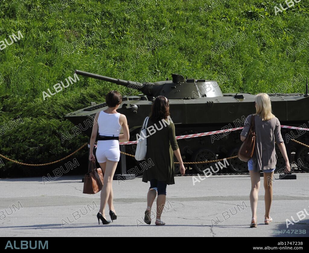 National Museum of the History of Ukraine in the Second World War. Great Patriotic War Museum. Girls visiting the exhibition of miltary equipment (tanks) of WWII. Kiev. Ukraine.