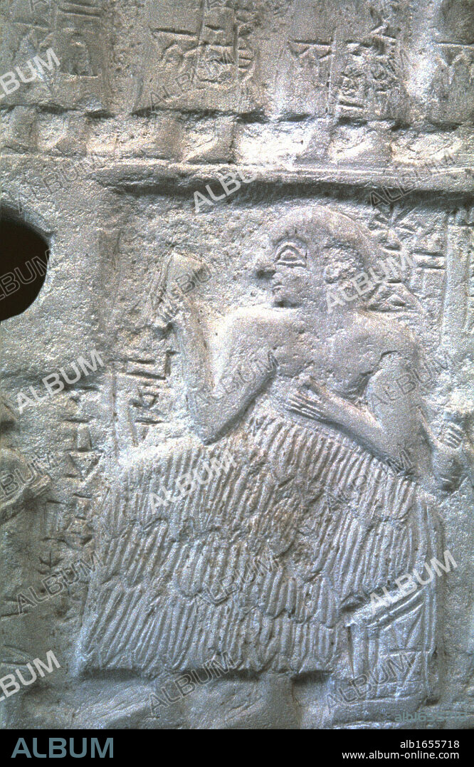 Ur-Nanshe, king of Lagash, Sumeria. Ur Dynasty I (2650-2350 BC) Detail of limestone relief showing Ur-Nanshe wearing traditional fur skirt or Kaunakes. Louvre, Paris.