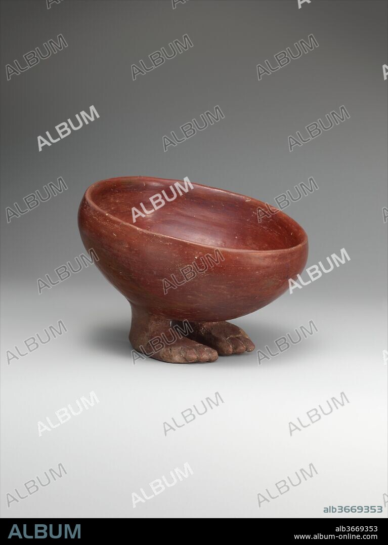 Bowl with Human Feet. Dimensions: diam. 13.2 x W. 13.7 x D. 9.8 cm (5 3/16 x 5 3/8 x 3 7/8 in.). Date: ca. 3900-3650 B.C..
In the Predynastic Period, potters created a wide variety of ceramic vessels. One unusual type is a bowl with supports shaped like human feet. This simple, round bowl, tipped slightly forward as if to offer its contents, has two such feet solidly attached to its underside. Made from Nile clay, the bowl has a smoothed, slipped, and polished surface, giving it a light sheen. The bowl standing on feet is very similar in form to the Egyptian hieroglyph meaning "to bring." Since none of the known bowls of this type comes from a well-understood context, archaeologists cannot interpret their original use. Perhaps vessels like this were placed above a tomb to present offerings from the living to the deceased, a practice that was an established part of funerary ritual in pharaonic Egypt. Alternatively, they may have held offerings to a deity in his shrine.
