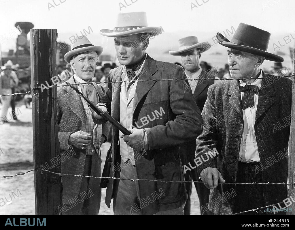 HARRY CAREY, JOSEPH COTTEN and OTTO KRUGER in DUEL IN THE SUN, 1946, directed by KING VIDOR. Copyright SELZNICK/RKO.