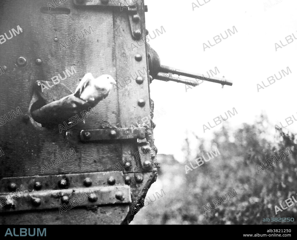 Homing pigeons were used extensively during WWI. Carrier pigeons were trained to transport messages back to their home coop behind the lines. When they landed, wires in the coop would sound a bell or buzzer and a soldier would know a message had arrived. He would retrieve the message from the canister, and send it to its destination by telegraph, field phone, or personal messenger. In 1914 during the First Battle of the Marne, the French army advanced 72 pigeon lofts with the troops. The US Army Signal Corps used 600 pigeons in France alone. One of their homing pigeons, a Blue Check hen named Cher Ami, was awarded the Croix de Guerre with Palm for heroic service delivering 12 important messages during the Battle of Verdun. On her final mission in October 1918, she delivered a message despite having been shot. The crucial message, found in the capsule hanging from a ligament of her shattered leg, saved about 200 US soldiers of the 77th Infantry Division's "Lost Battalion".