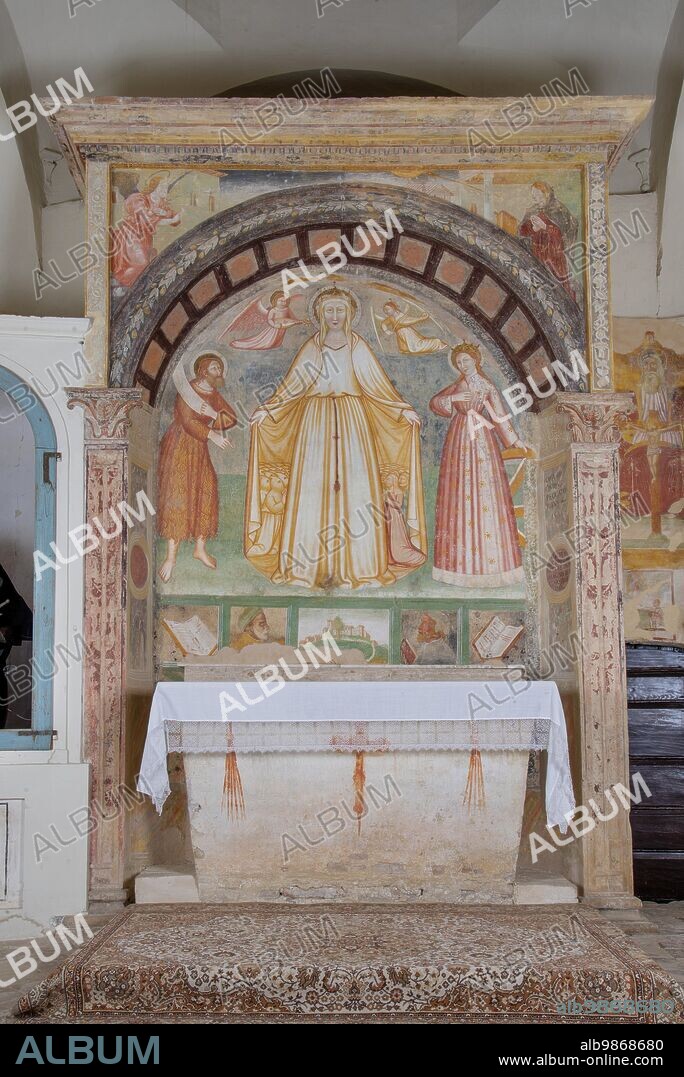 Monteleone di Fermo (Italy, Marche - Fermo province) Misericordia church. Altar, Master of St. Augustine of Fermo, Madonna of Mercy between St. John the Baptist and St. Catherine of Alexandria, fresco, early 15th century.