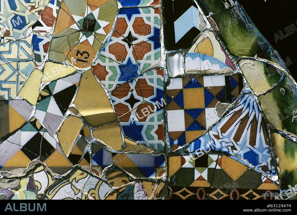 Barcelona, Catalonia, Spain. Park Guell, designed by Antonio Gaudi, 1900-1914. Mosaic on the main terrace, detail. Ceramic technique called Trencadis (fragments of ceramic). Catalan Modernism.