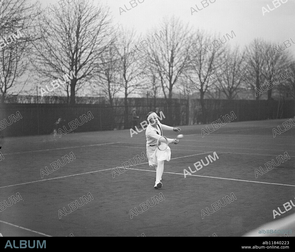 Surrey Hard Court Championships at Roehampton . Miss Gwen Sterry in play . 16 April 1929.