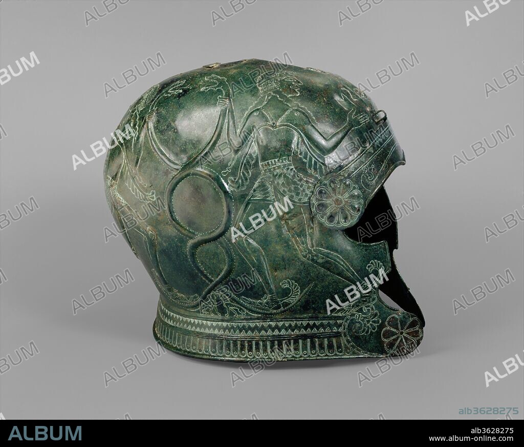 Two bronze helmets. Culture: Greek, Cretan. Dimensions: H. (1989.281.49): 9 5/8 in. (24.5 cm)
H. (1989.281.50): 8 1/4 in. (21 cm). Date: late 7th century B.C..
These helmets and the three mitrai exhibited below them are the finest pieces of a large cache of armor that came to light in southern central Crete, where it was undoubtedly made. The inscriptions suggest that the armor was captured as booty and offered as a dedication. In repoussé on both sides of one helmet is a pair of winged youths grasping a pair of intertwined snakes. Below them are two panthers with a common head. The helmet is inscribed "Neopolis." In repoussé on both sides of the other helmet is a horse; incised on each cheekpiece is a lion. The inscription states that Synenitos, the son of Euklotas, took this object.