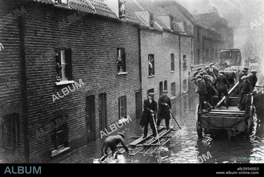 Flooding of London, January 1928 (1937). 14 people were killed when the Thames flooded in London on 6th-7th January 1928. A print from The Story of Seventy Momentous Years, the Life and Times of King George V, 1865-1936, editor Harold Wheeler, Odhams Press Ltd, London, 1937.
