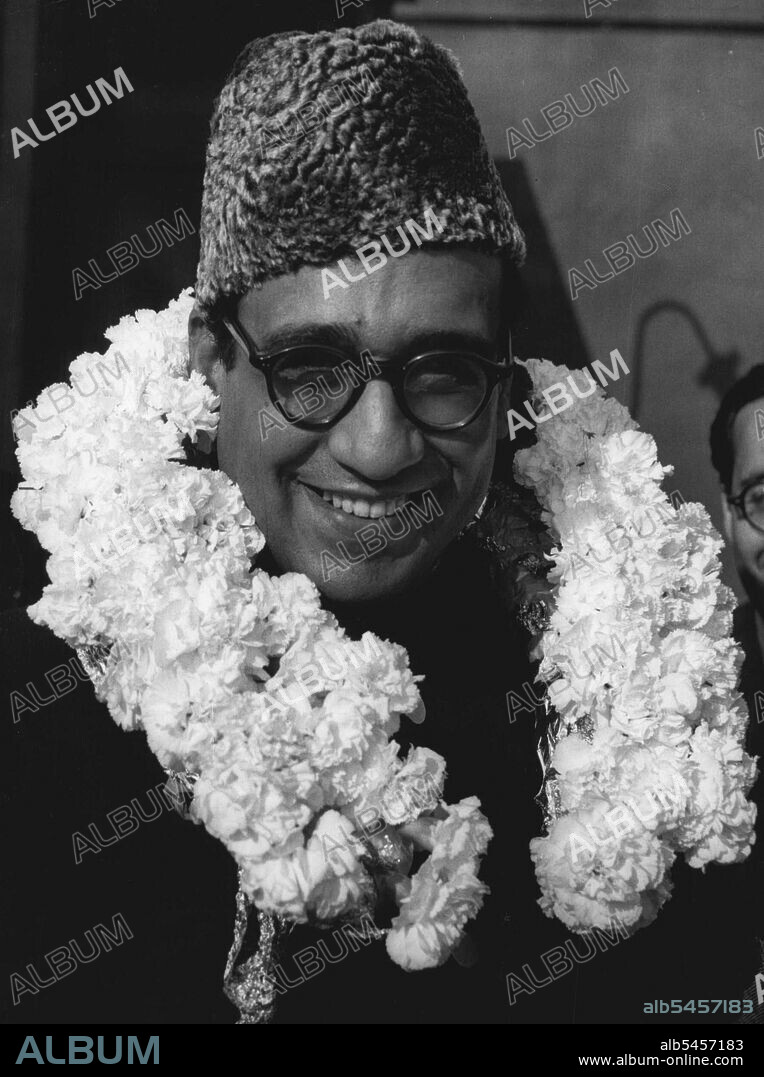 Pakistan's First High Commissioner Arrives in Britain.Habib Ibrahim Rahimtoola, wearing about his neck the floral horse-shoe with which he was garlanded on arrival at London airport, August 13.Habib Ibrahim Rahimtoola, first high Commissioner for Pakistan in London, arrived at London airport (heathrow), today August 13.The London secretary of the Moslem Leage, presented him with a red and white horshoe of carnations for luck as he stepped from the plane in which he had flown from Karachi."We small play our part in the International Co-Operation", he said, "And abide by the principles of the United Nations". August 01, 1947. (Photo by The Associated Press Ltd.).