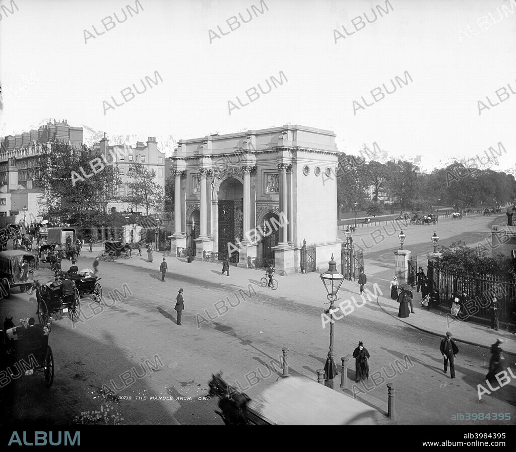 Marble Arch, Hyde Park, London, before 1908. Marble Arch was designed by John Nash in 1827 as the ceremonial gateway to the refurbished Buckingham Palace, but in 1851 it was moved to its present position at the corner of Hyde Park. In 1908 a new road, Cumberland Gate, was cut across the corner of the Park leaving Marble Arch on a traffic island.