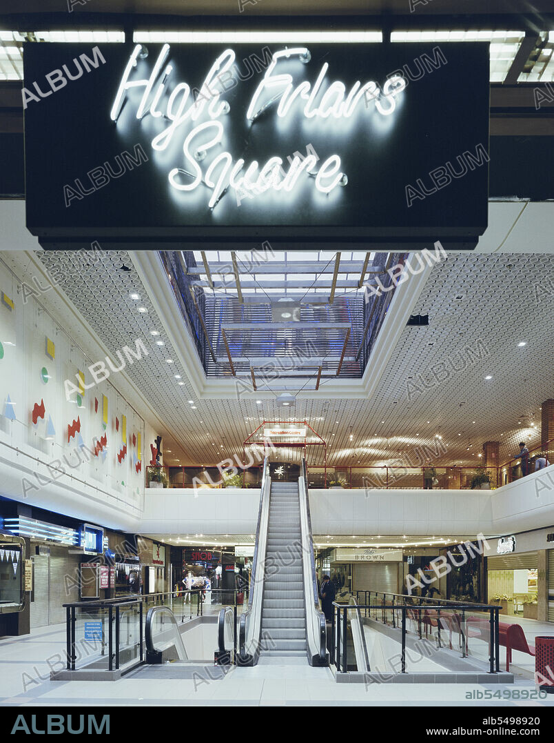 JOHN LAING PLC. Eldon Square Shopping Centre, Newgate Street, Newcastle upon Tyne, 06/10/1987. A neon sign reading 'High Friars Square' at bottom of an escalator at the Eldon Square shopping centre in Newcastle. Laing won the £5.2m contract to extend the shopping centre in March 1986 for completion in October 1987, a second contract in January 1987 to build the retail unit that bridges Blackett Street and connects the old with the new development and a third in May 1987 for improvements and upgrading across the whole Eldon Square site. High Friars way, one of the routes through the shopping centre, takes its name from High Friars Chare, a medieval alleyway or street in north eastern dialect, whose course it roughly follows.  Presumably High Friars Square, pictured, lies at one end of this passageway.