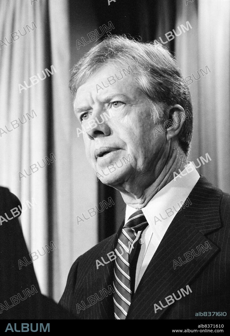 James Earl 'Jimmy' Carter Jr. (born October 1, 1924) is an American politician who served as the 39th President of the United States from 1977 to 1981. In 2002, he was awarded the Nobel Peace Prize for his work with the Carter Center.<br/><br/> . Carter, a Democrat raised in rural Georgia, was a peanut farmer who served two terms as a Georgia State Senator, from 1963 to 1967, and one as the Governor of Georgia, from 1971 to 1975. He was elected President in 1976, defeating incumbent President Gerald Ford in a relatively close election; the Electoral College margin of 57 votes was the closest at that time since 1916.<br/><br/> . On his second day in office, Carter pardoned all evaders of the Vietnam War drafts.