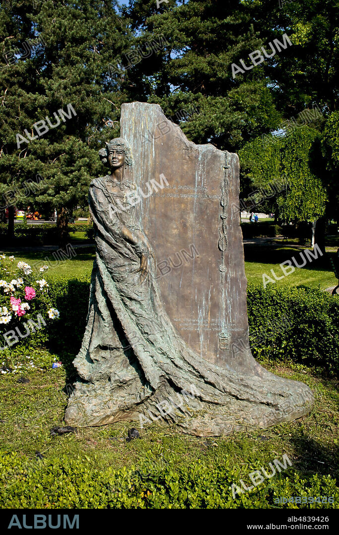 Como, Lombardy, Italy. Lake of Como. Monument to Mafalda of Savoy (Mafalda di Savoia).. In the gardens, overlooking Lake Como, a bronze statue commemorates Princess Mafalda of Savoy who died on August 28, 1944 in the Buchenwald concentration camp. The work was created by Massimo Clerici in 2002.