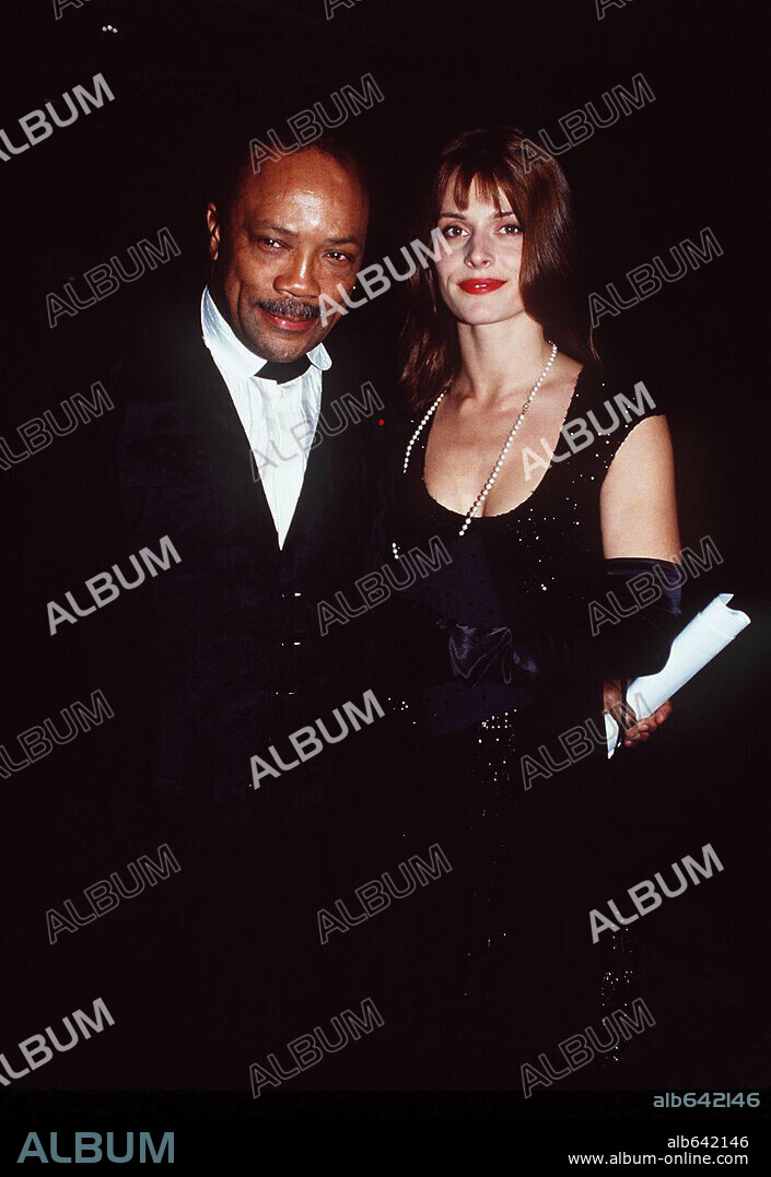 QUINCY JONES American Composer, Arranger, Producer and Recording Artist with NASTASSJA KINSKI German Actress. 21/11/1994