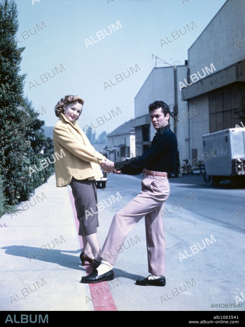 PIPER LAURIE and TONY CURTIS.