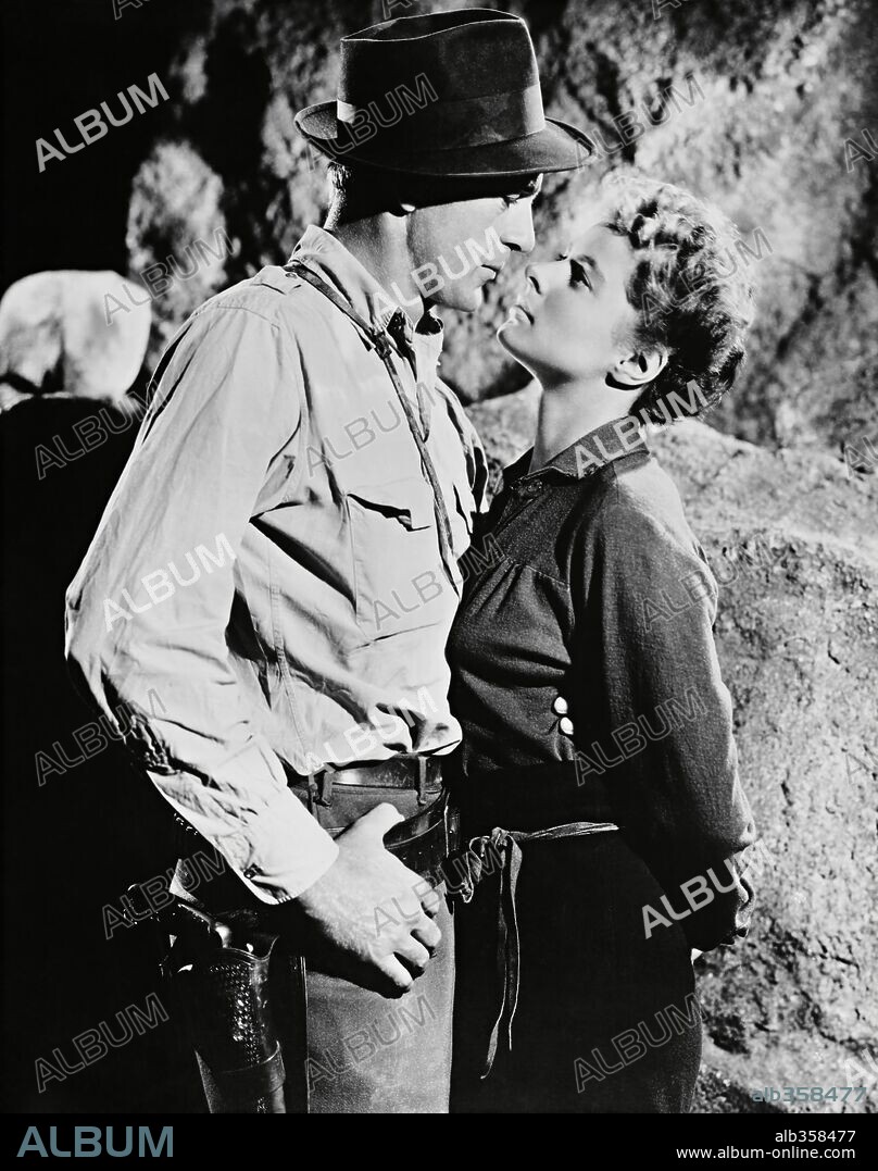 GARY COOPER and INGRID BERGMAN in FOR WHOM THE BELL TOLLS, 1943, directed by SAM WOOD. Copyright PARAMOUNT PICTURES.