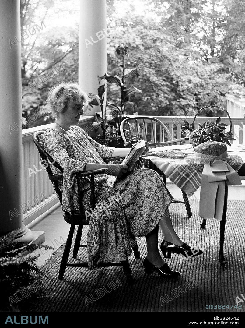 Lou Henry Hoover (March 29, 1874 - January 7, 1944) served as First Lady of the US from 1929-33. She was a fine horsewoman, who hunted, and preserved specimens with the skill of a taxidermist. In 1894 she enrolled, as the school's only female geology major, at Stanford University, where she met Herbert Hoover. Marrying her engineer husband in 1899, she traveled widely with him, and became a cultivated scholar and linguist. In the White House the Hoovers would sometimes converse in Chinese to foil eavesdroppers. To date, she is the only First Lady to speak an Asian language. She distinguished herself by becoming the first First Lady to broadcast on a regular basis. Although she did not have her own radio program, she participated as a guest speaker on a number of occasions, often advocating for volunteerism, or discussing the work of the Girl Scouts. She collaborated with her husband in translating Agricola's De Re Metallica, a 16th century encyclopedia of mining and metallurgy. The Hoover translation was published in 1912, and remains in print today as the standard English translation. She died of a heart attack in 1944 at the age of 69. Photographed by the National Photo Company July 26, 1926.