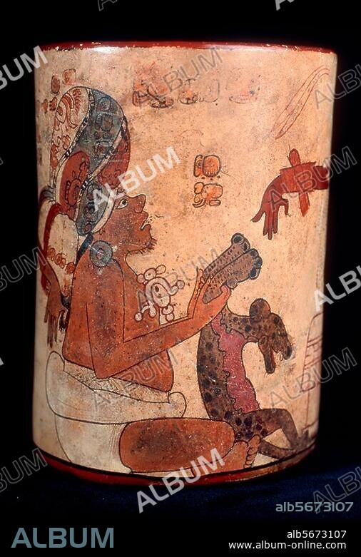 Maya culture, Late Classic, 700-800 AD. Cylindrical vessel with court scene. (Detail: seated man with baby jaguar). Clay, painted; height 13.2cm (a. Q. 14cm). Origin: Tikal, El Petén, Guatemala, structure 5C-49. Inv. no. 11418. Guatemala, Museo Nacional de Arqueologia.