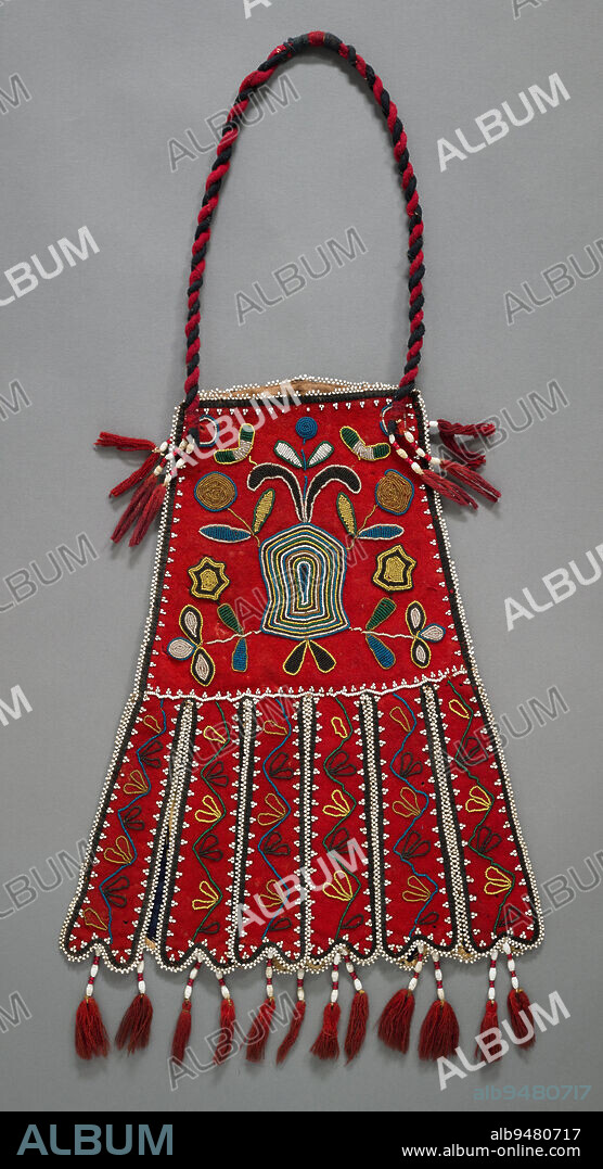 Firebag, c. 1830, 12 1/4 × 26 1/2 in. (31.12 × 67.31 cm) (with tassels and cord), Wool, beads, United States, 19th century, In the early 1800s, a particular kind of elaborately beaded baga firebagcaptured the imagination of Native women artists in the Subarctic, the Northern Plains, and some coastal regions of the Pacific Northwest. Firebags were made to store tobacco and flint, and are also known as Octopus Bags, a reference to their dangling, tentacle-like tabs at the base of the pouch. This particular firebag displays beadwork similar to that of the Dakhóta, Metis, and Cree peoples, known for their skillful use of tiny beads, with a bold central design and subtle floral motifs on red wool. In addition to the very fine beaded work that frames the piece, there are two beaded eagle designs on the back of the bag, making it unique.
