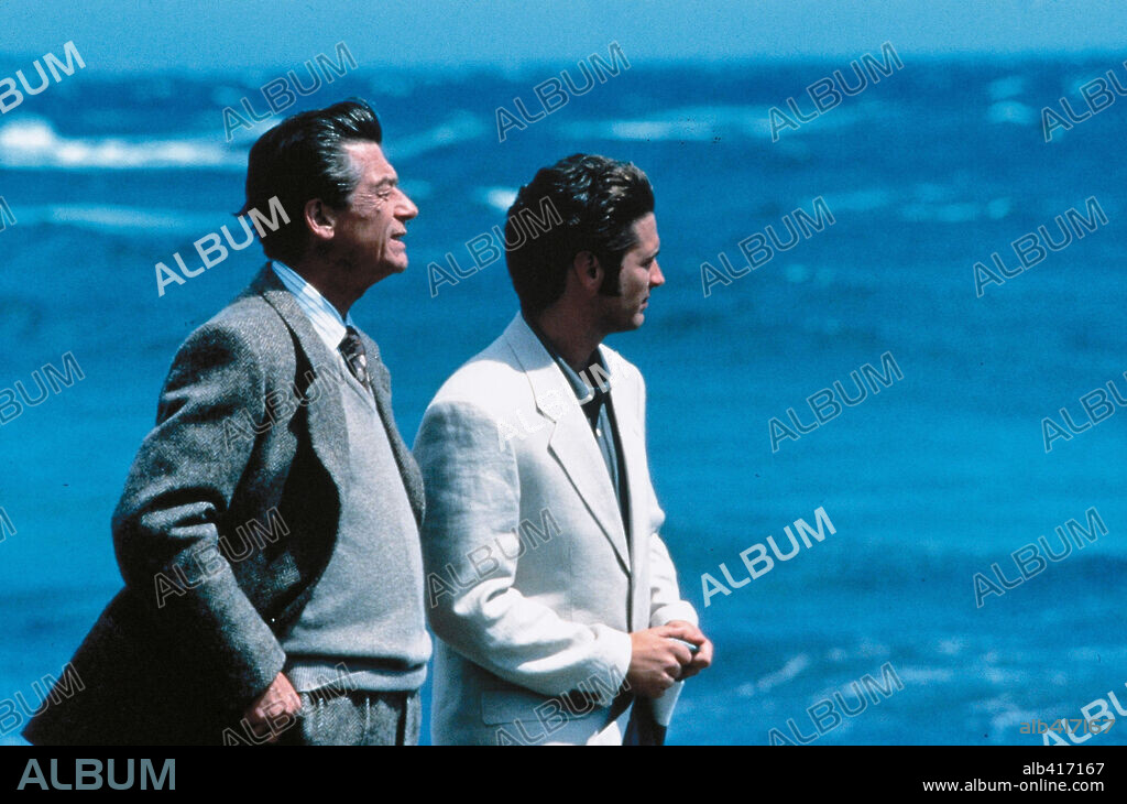 JASON PRIESTLEY and JOHN HURT in LOVE AND DEATH ON LONG ISLAND, 1997, directed by RICHARD KWIETNIOWSKI. Copyright MIKADO FILMS/BBC/BRITISH SCRREN/SALES CO.