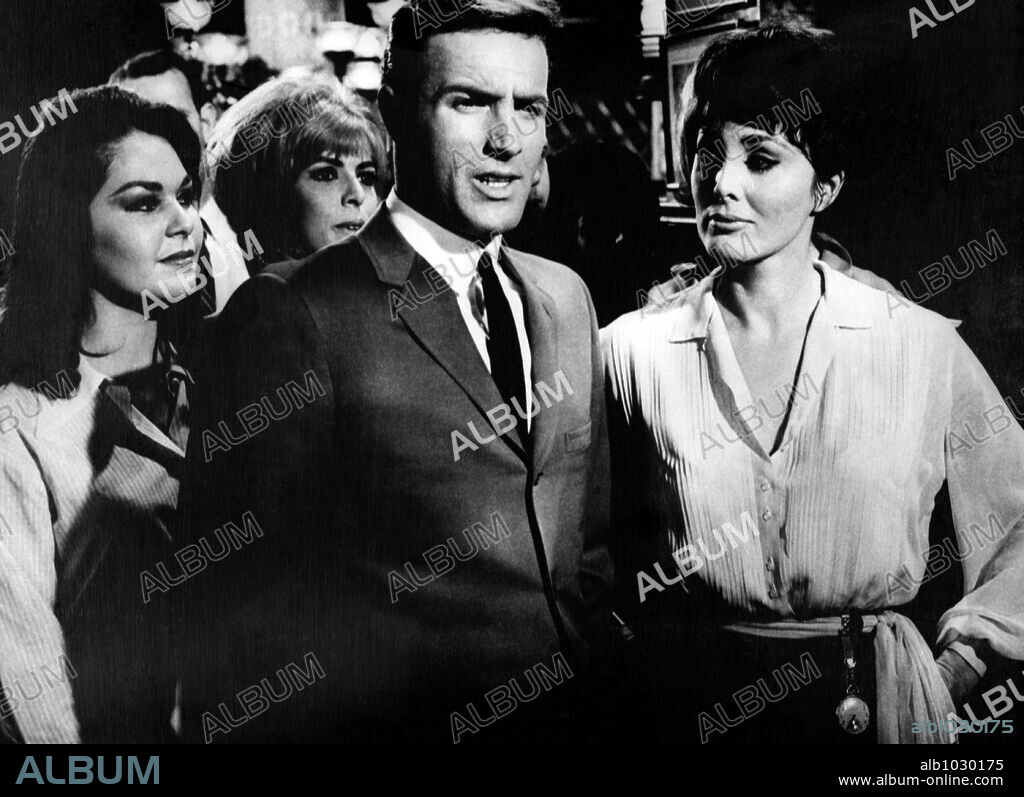 CHARLENE HOLT and JAMES CAAN in RED LINE 7000, 1965, directed by HOWARD HAWKS. Copyright PARAMOUNT PICTURES.